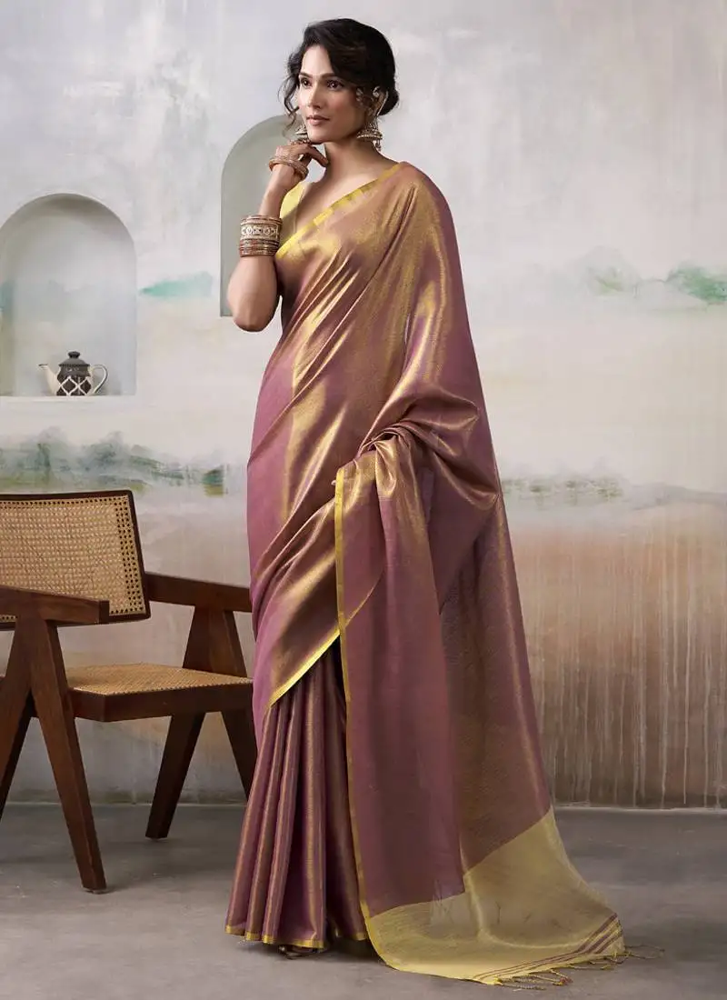 Rust tissue silk with beautiful tussle festival wear saree