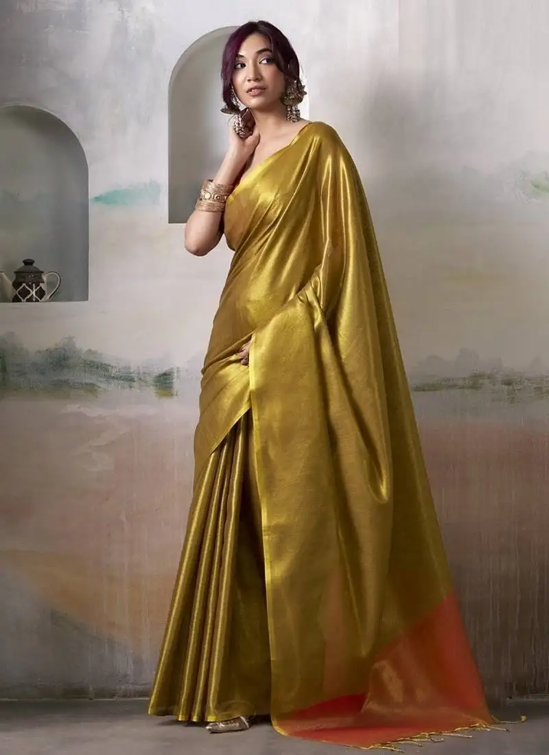 Golden tissue silk with beautiful tussle festival wear saree