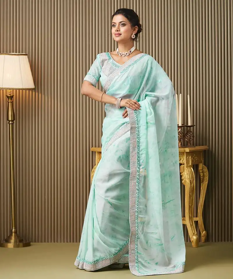Turquoise blue color organza fabric embroidered embellished work ceremonial saree