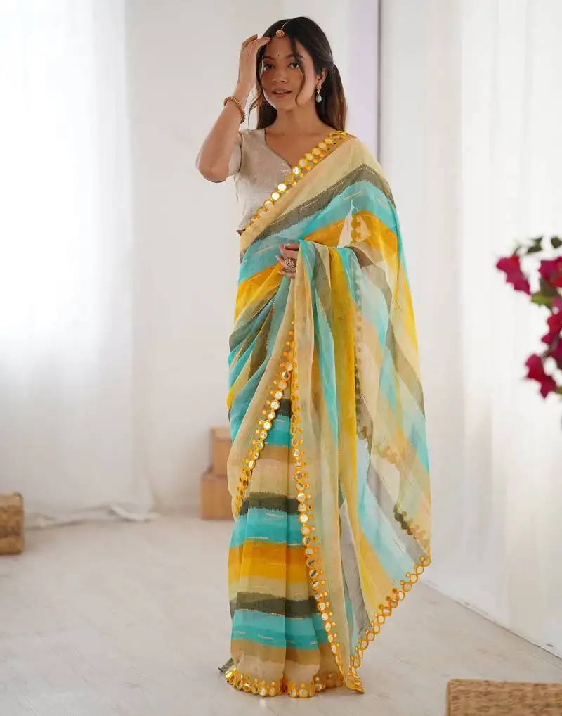 Yellow color chiffon fabric designer laheriya printed saree with mirror cut work