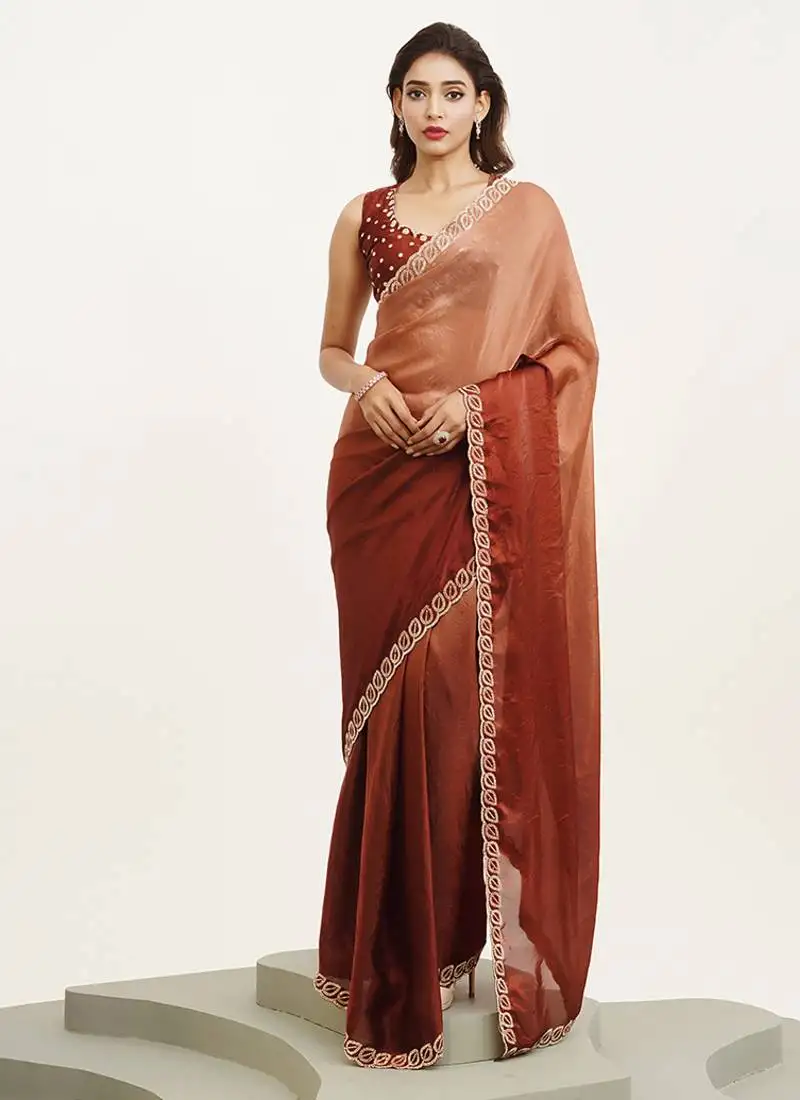 Rust color satin fabric embellished beads and stones work fancy saree