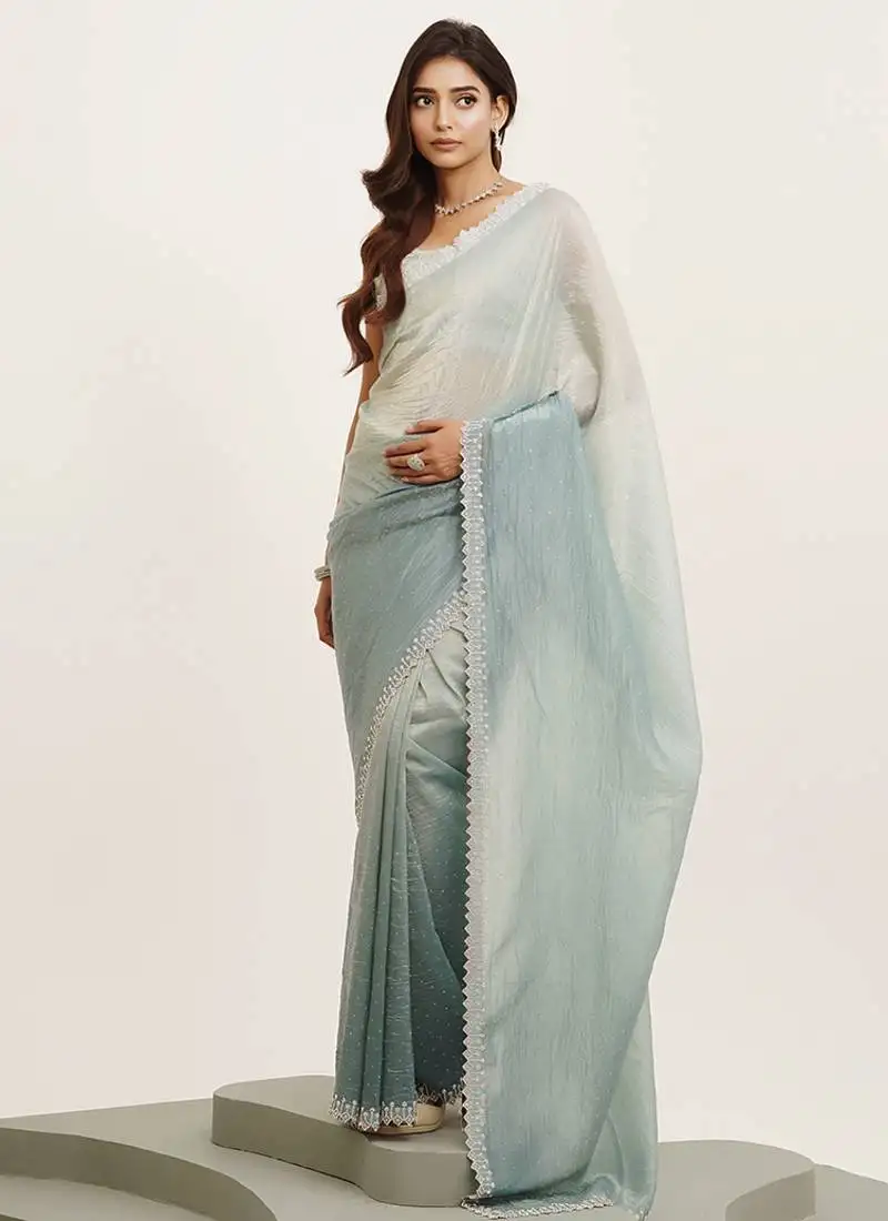 Turquoise blue color tissue fabric embellished beads and stones work fancy saree