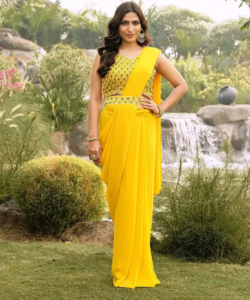 Yellow ready to wear georgette saree with unstitched embroidered blouse and waist belt
