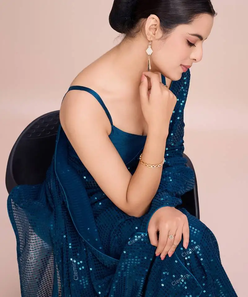 Embellished petrol blue color bollywood georgette saree with unstiched blouse