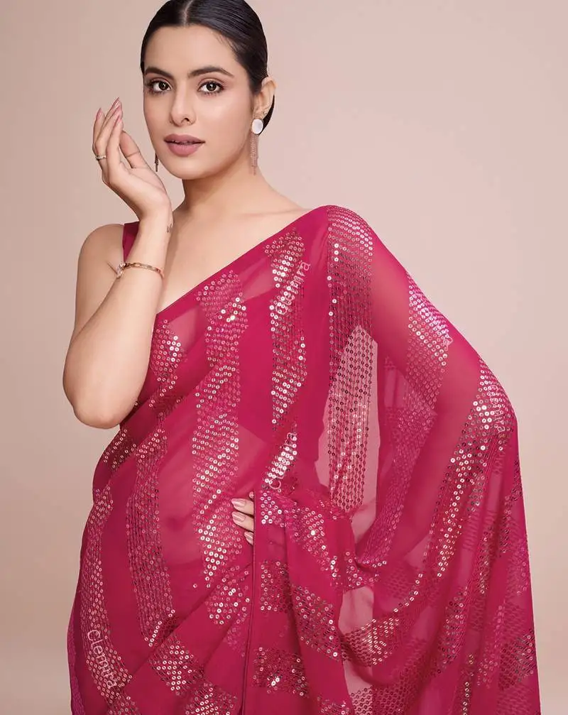 Embellished rose pink color bollywood georgette saree with unstiched blouse