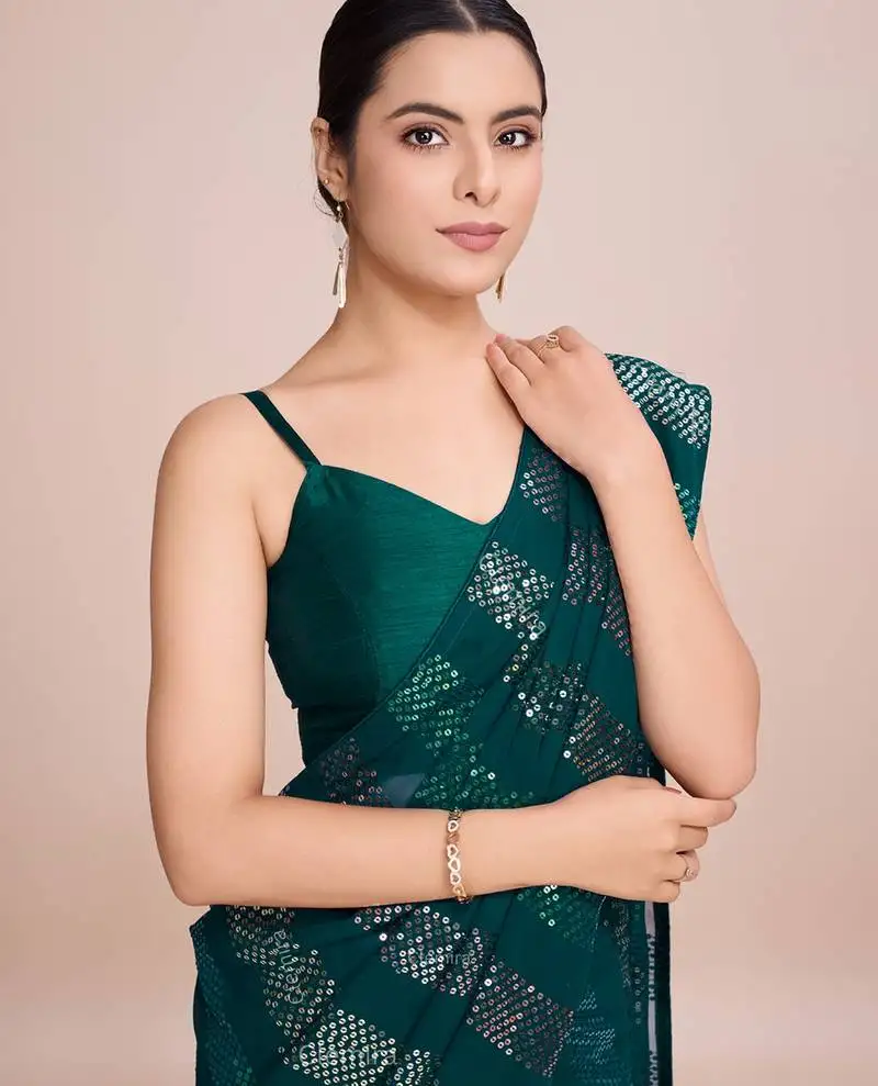 Embellished teal color bollywood georgette saree with unstiched blouse