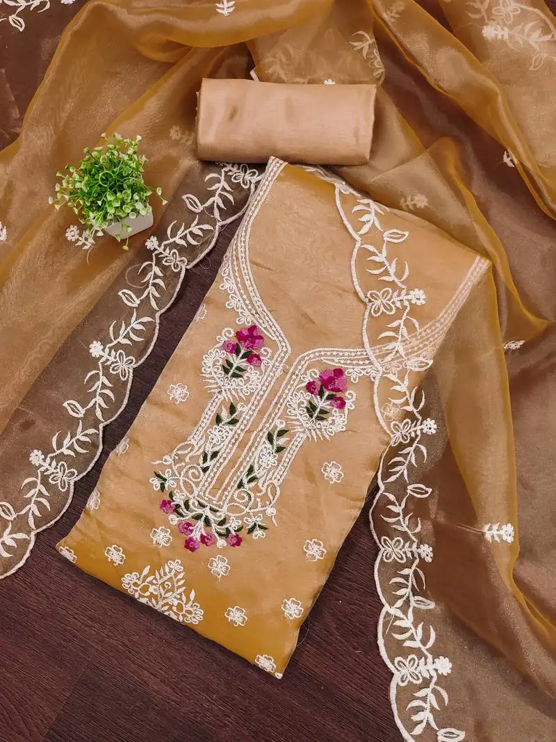 Women's peach unstitched embroiderd organja dress material