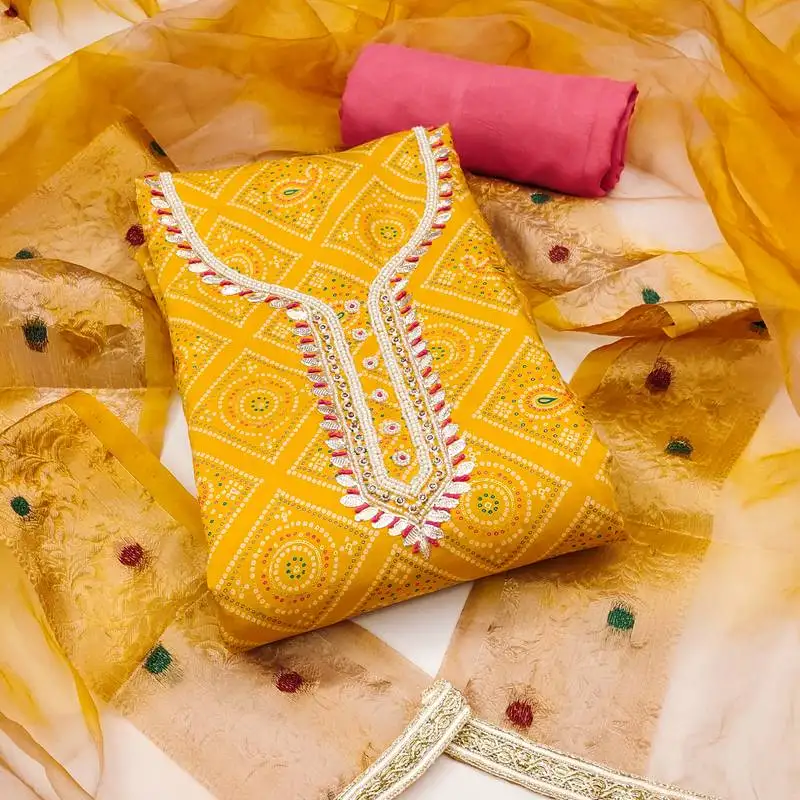 Women's yellow unstitched printed cembric cotton dress material