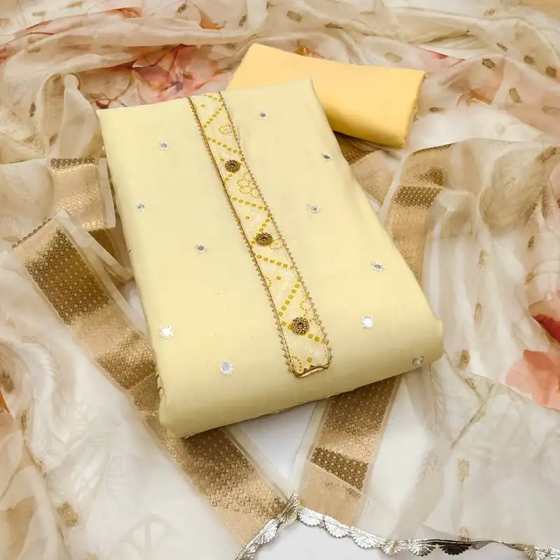 Women's light yellow unstitched embroiderd pure cotton silk dress material