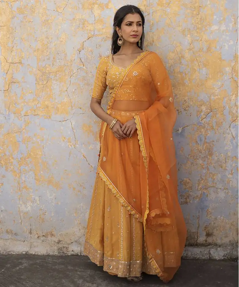 Saffron embroidered silk lehenga