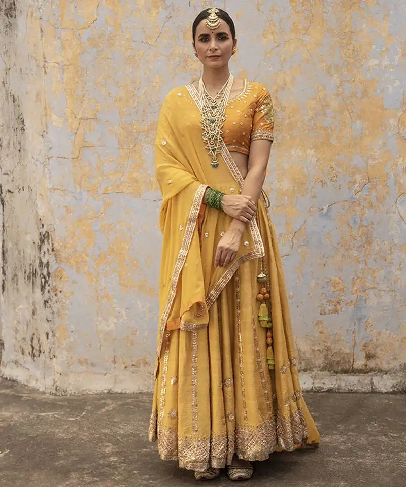 Yellow embroidered silk lehenga