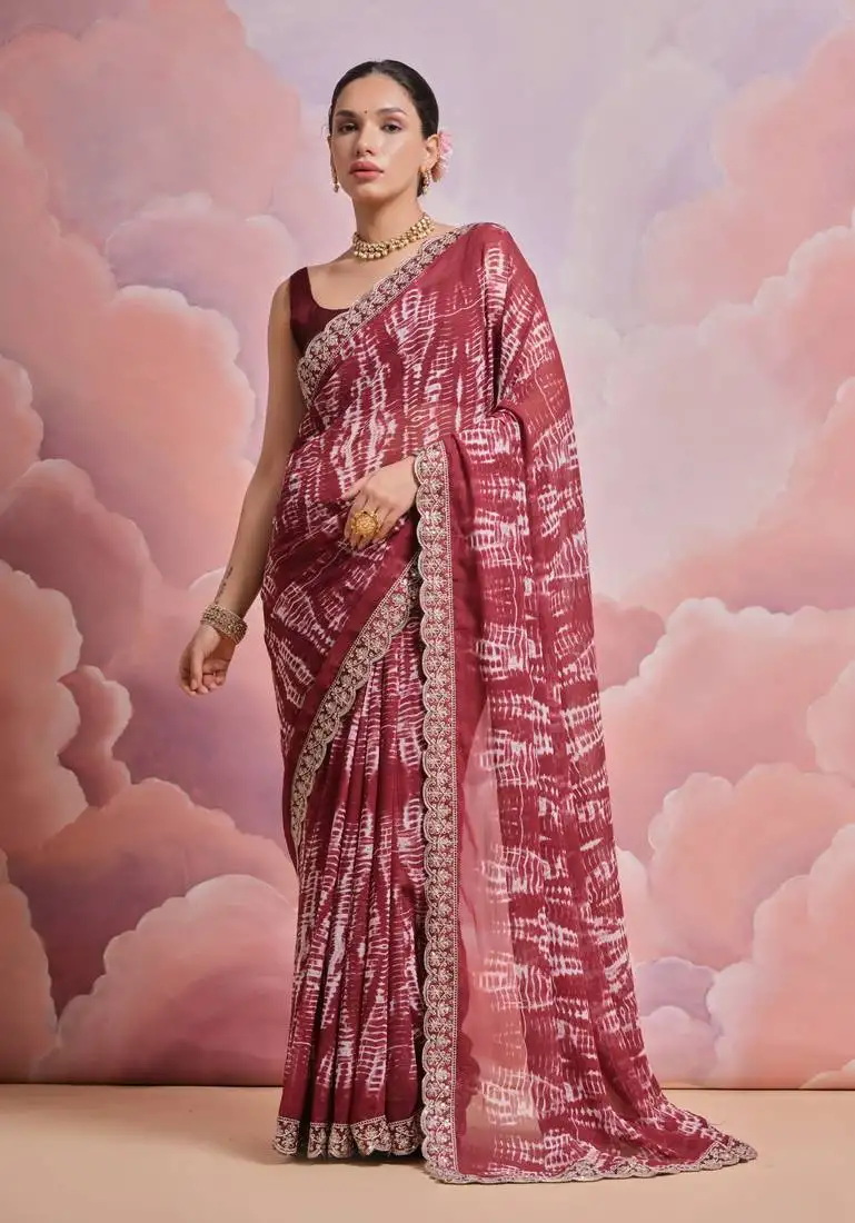 Red printed georgette saree with embroidered lace