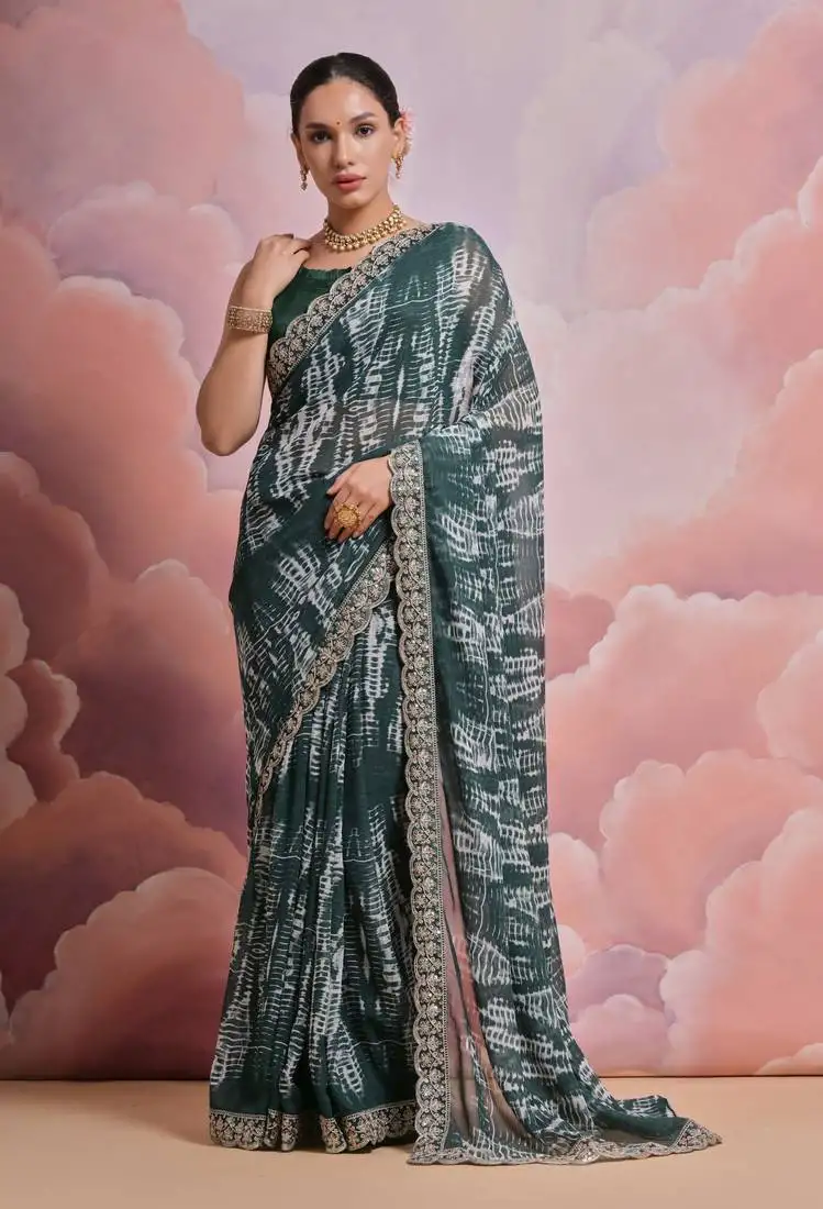 Dark green printed georgette saree with embroidered lace