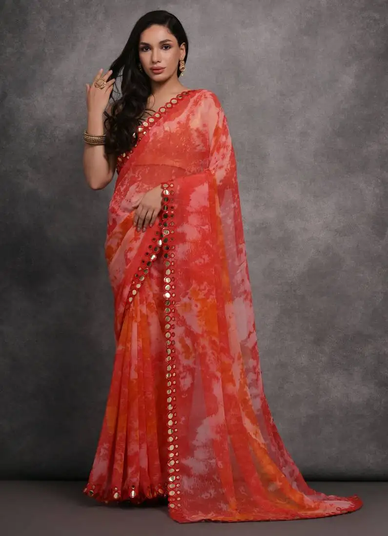 Red printed georgette saree with mirror work border