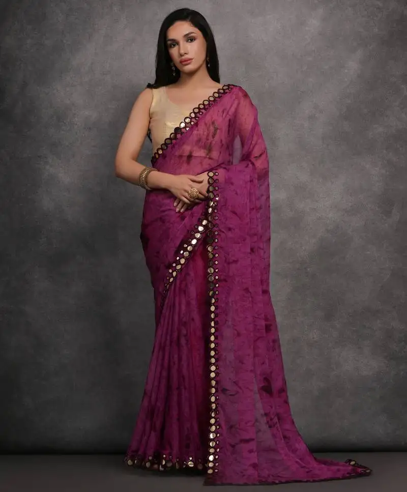 Purple printed georgette saree with mirror work border