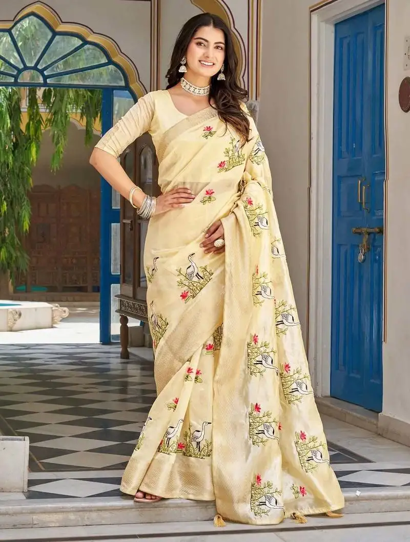 Yellow thread embroidered silk blend saree