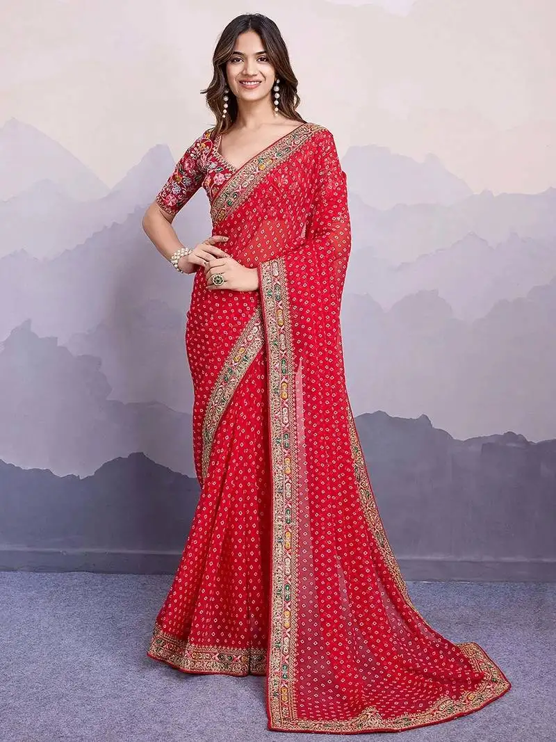 Red embroidered saree with blouse