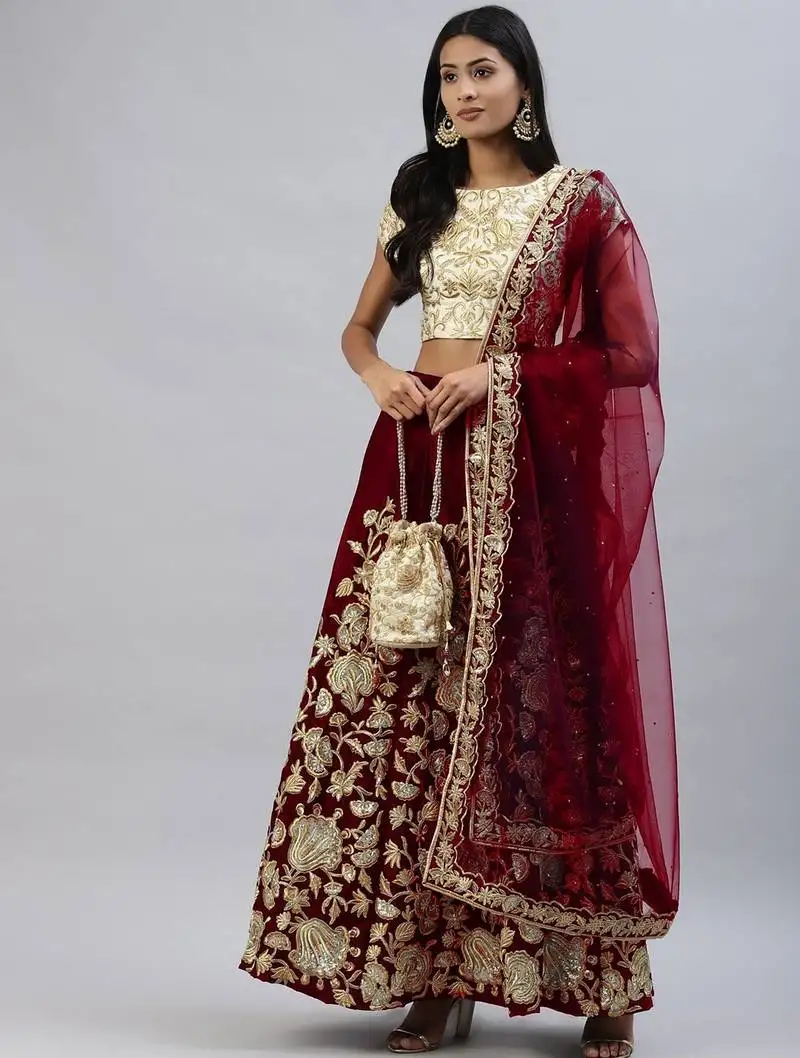 Maroon zari sequins embroidered velvet lehenga choli