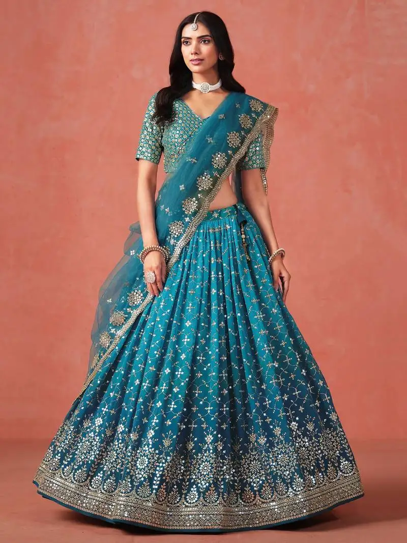 Turquoise georgette sequins zari embroidered lehenga choli