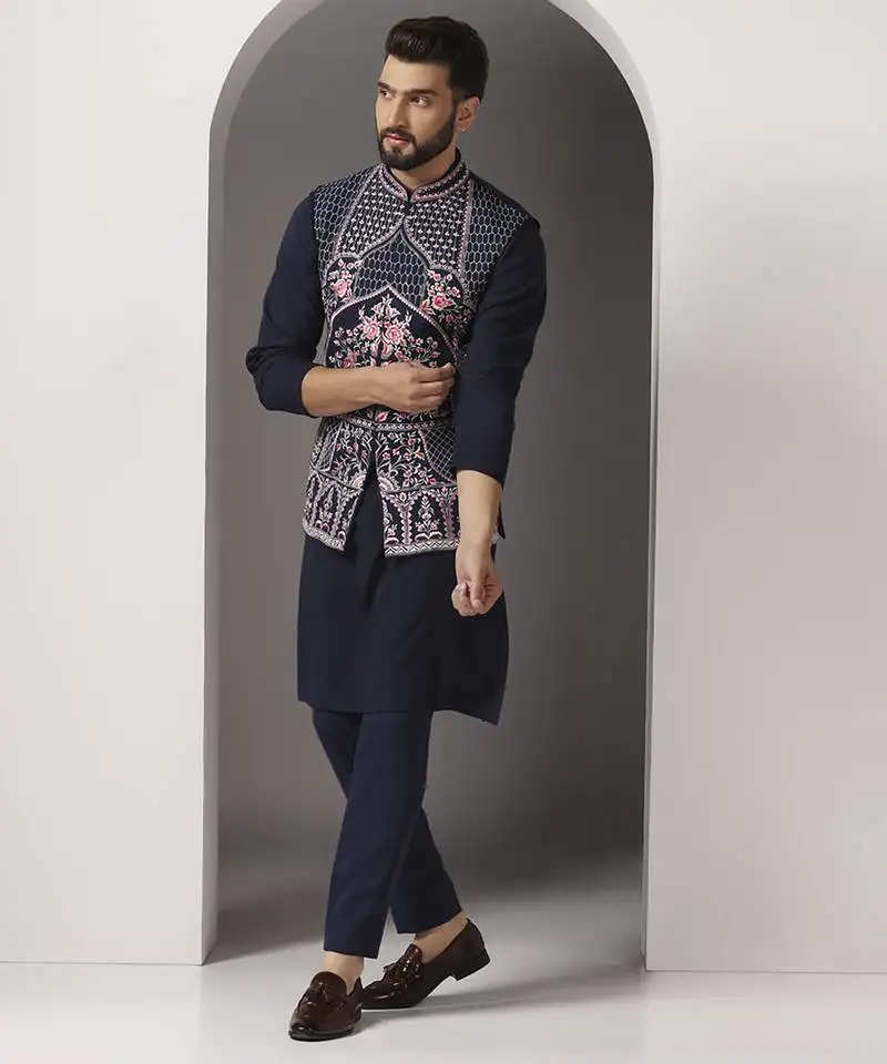 Blue embroidered crepe kurta set with blue embroidered jacket