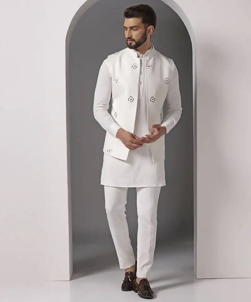 Ivory embroidered crepe kurta set with mirror ivory jacket