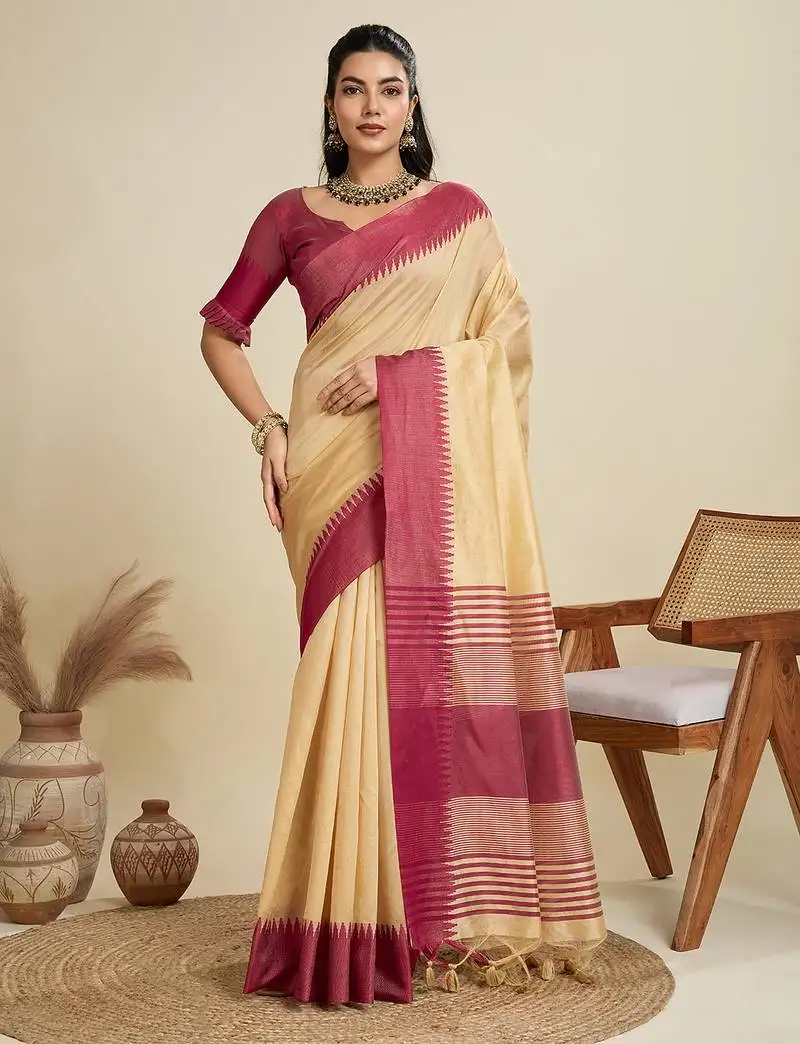 Beige silk blend saree with contrast red temple border