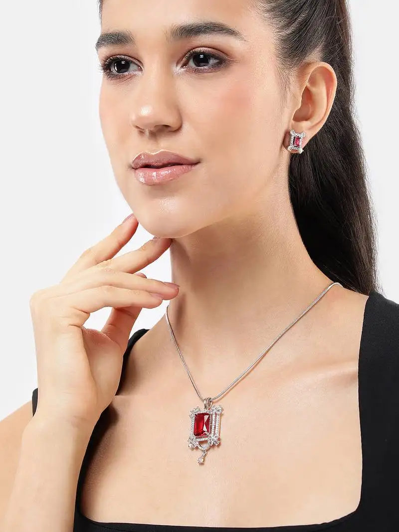 Rhodium white plated ruby pink cubic zirconia pendant set with chain & earrings