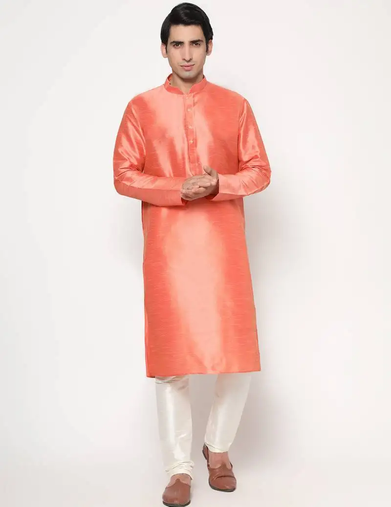 Peach silk kurta pajama set with white churidar ethnic outfit for festivals & weddings