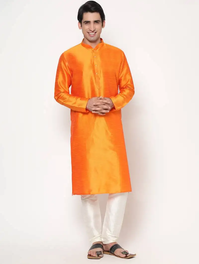 Orange silk kurta pajama set in with white churidar ethnic outfit for festivals & weddings