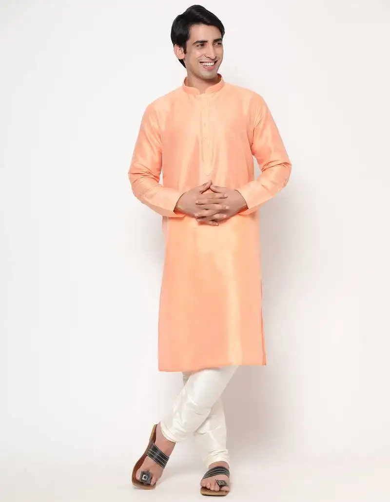 Coral silk kurta pajama set in with white churidar ethnic outfit for festivals & weddings
