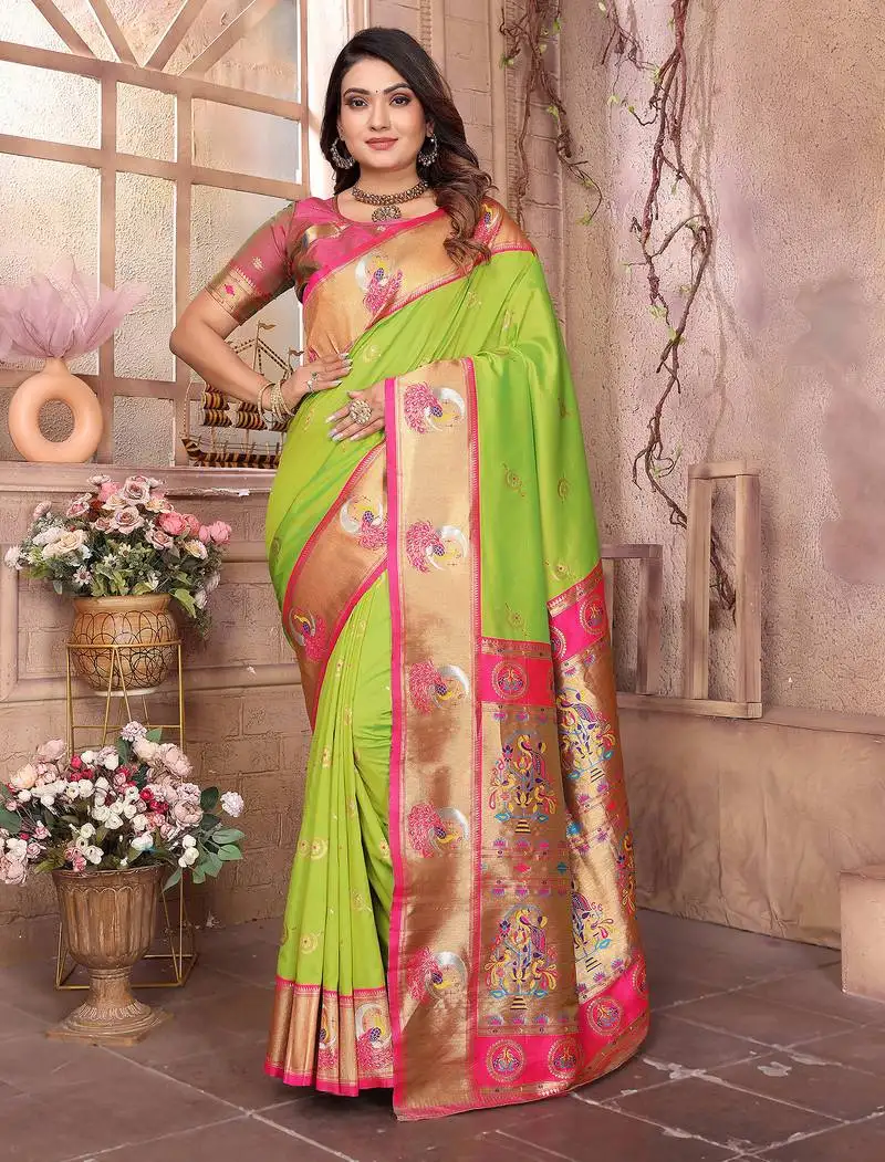 Light green silk blend zari weaving paithani saree with peacock border and pallu