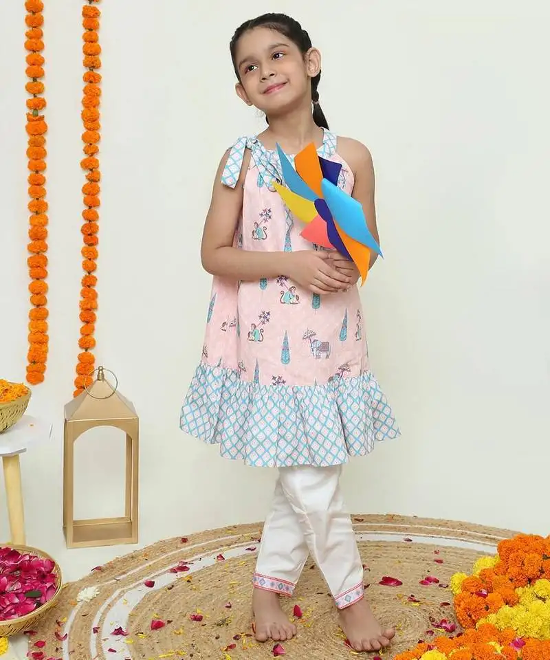 Pink dual ruffle dress with tie bow detailing ::Organic cotton