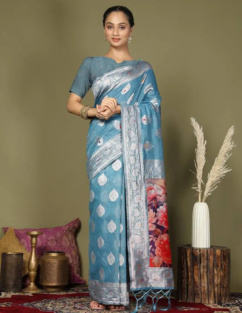 Sky blue floral linen cotton saree with zari border and digital printed pallu