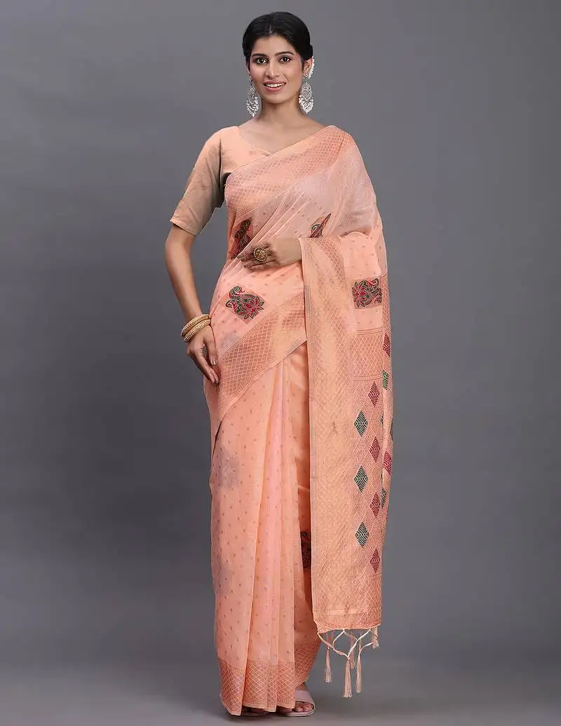 Peach linen cotton saree with woven pallu butta work and tassels