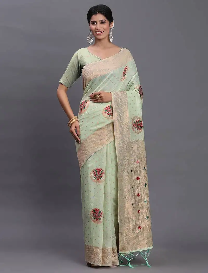Light green linen cotton saree with woven pallu butta work and tassels