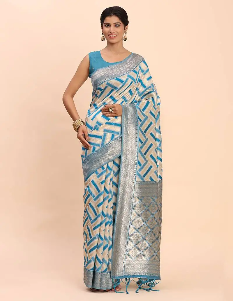 Cream linen cotton saree with sky blue pallu and contrast blouse piece