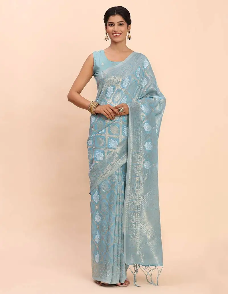 Sky blue linen cotton saree with silver zari weave and tassels