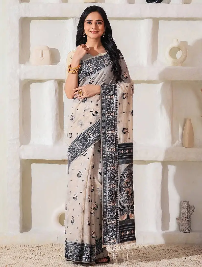Elegant woven linen cotton saree for durga puja & diwali | ethnic motif design with rich zari border sari