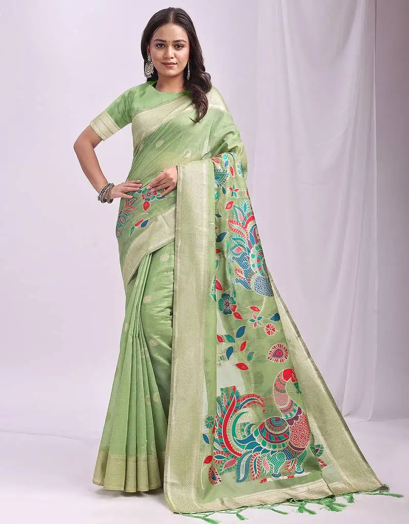 Light green linen cotton saree with peacock pallu zari border