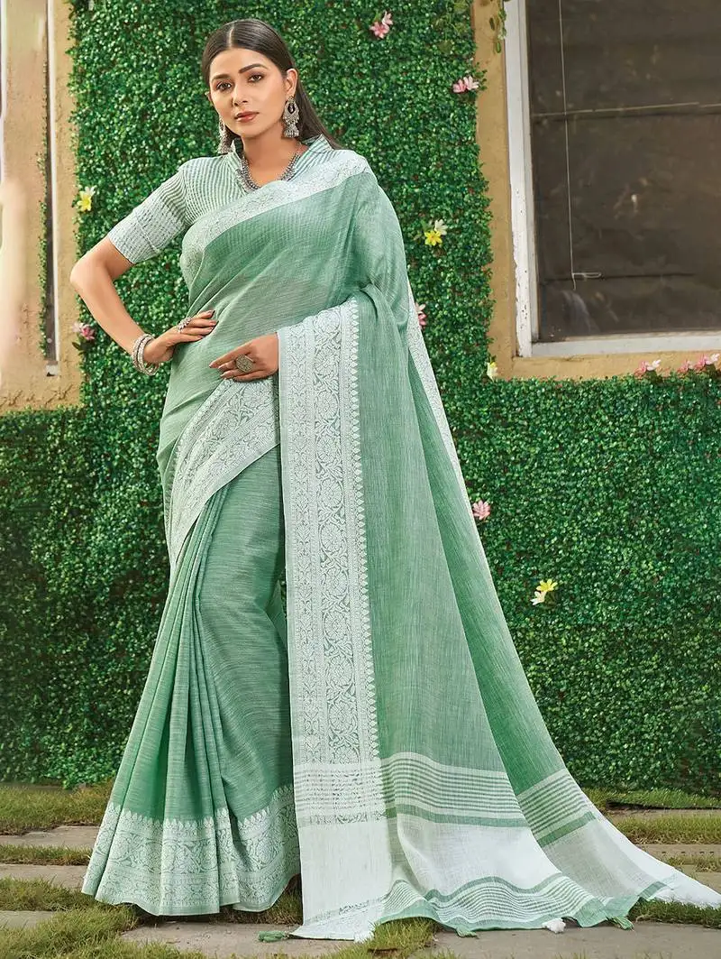 Sea green linen cotton saree with intricate woven border contrast pallu