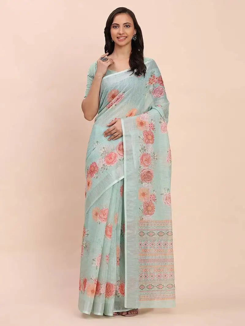 Sea green cotton cotton saree with tribal floral print