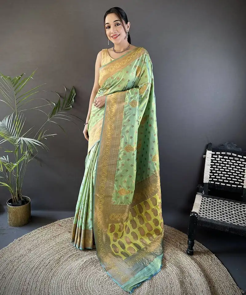 Light green silk blend copper zari weaving banarasi saree with contrast blouse