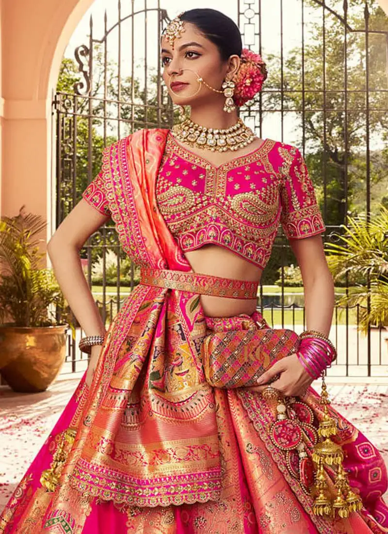 Rani pink banarasi silk woven zarkan cut work embroidered lehenga choli