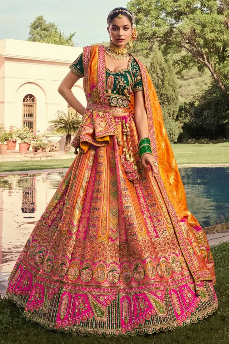 Mustard banarasi silk woven zarkan cut work embroidered lehenga choli