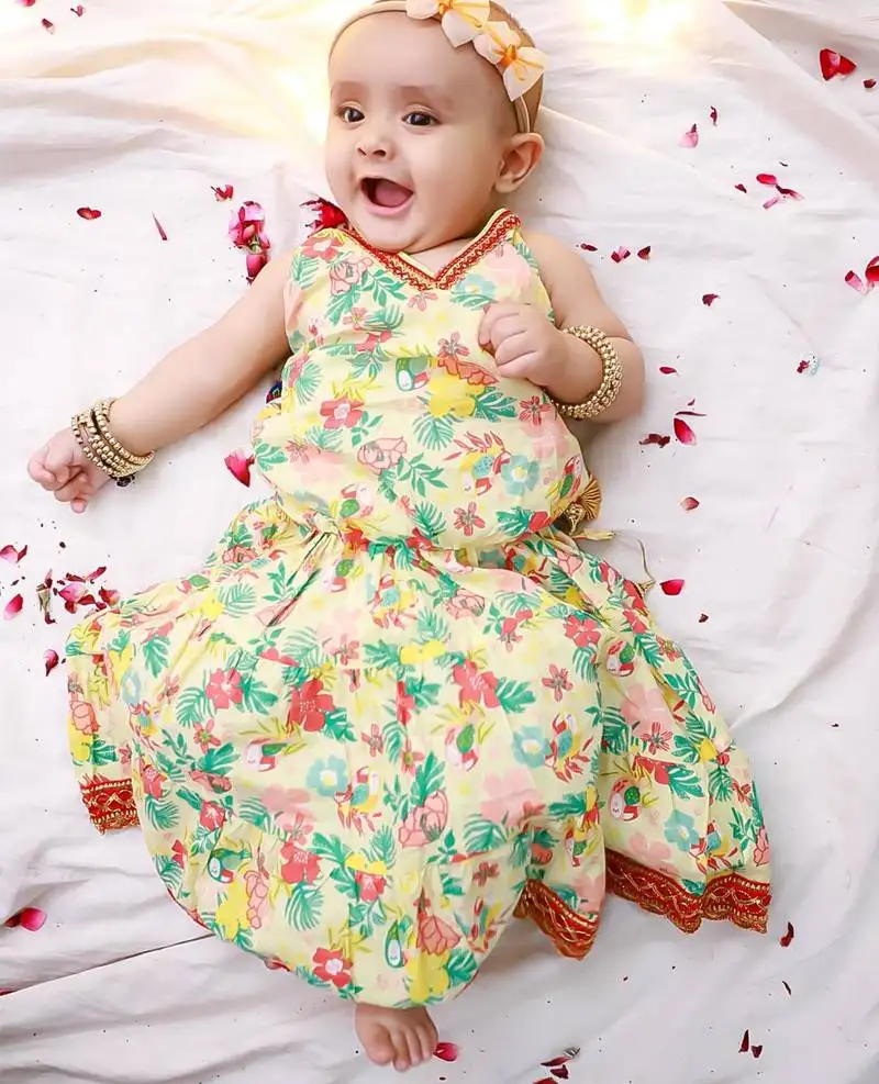 Yellow printed cotton choli with skirt set for girls