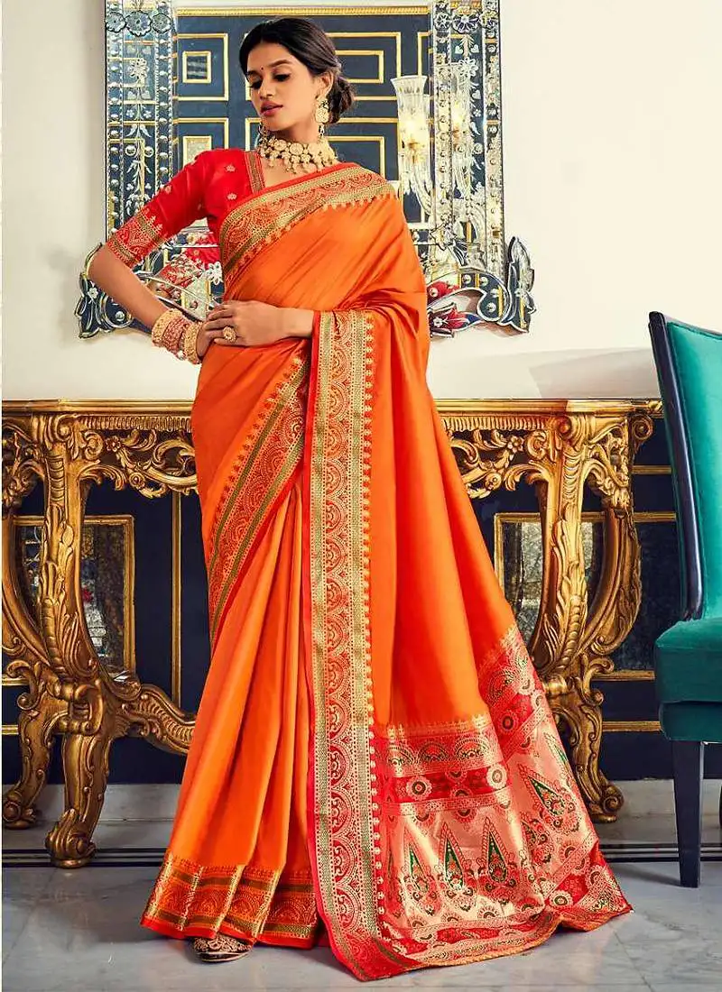 Orange soft silk party wear designer saree