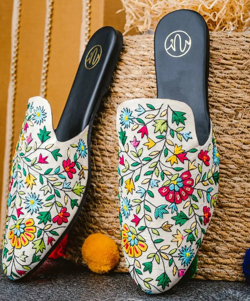 White embroidered leather mules