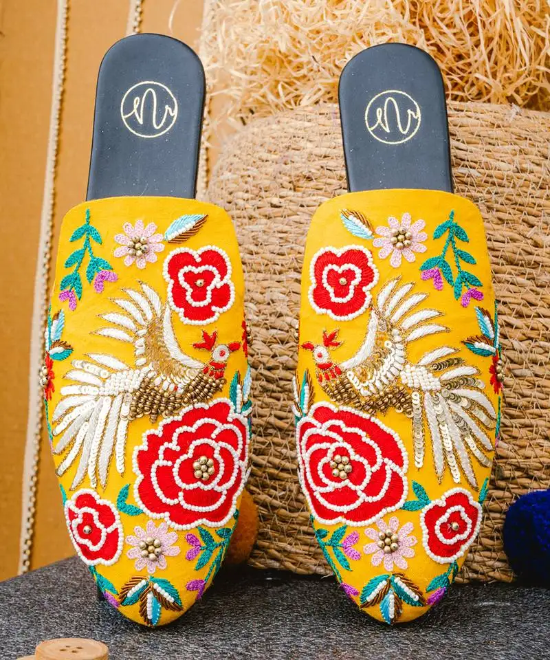 Yellow embroidered leather mules
