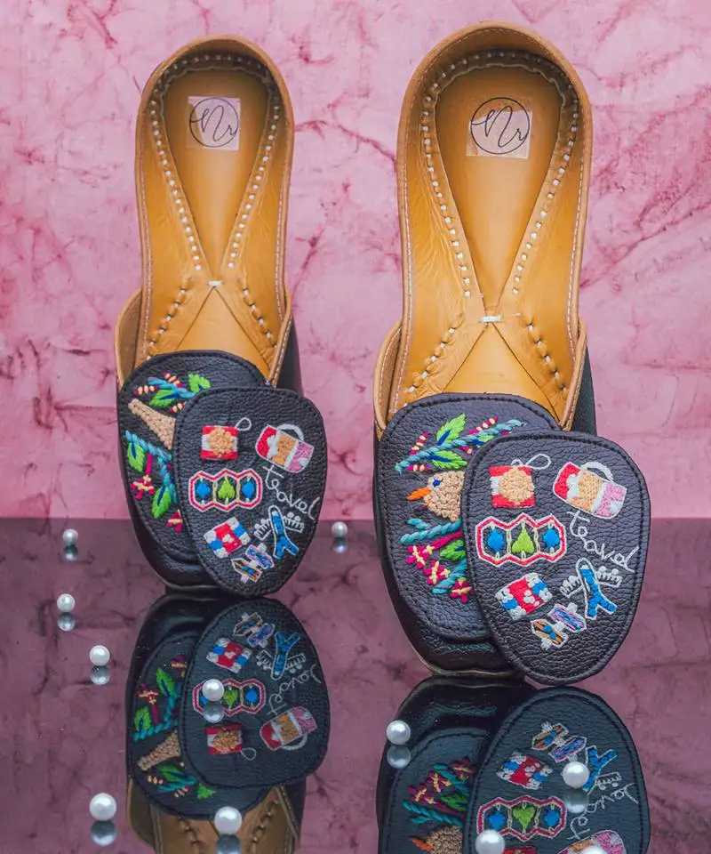 Navy blue embroidered leather juttis