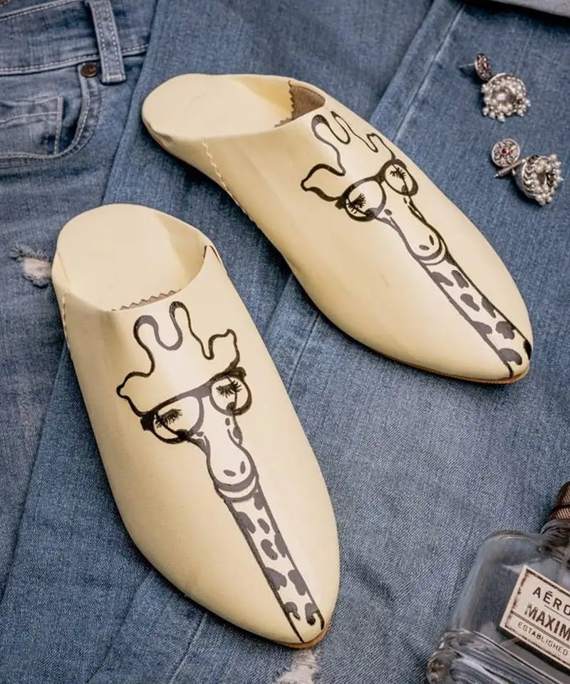 Yellow printed leather mules